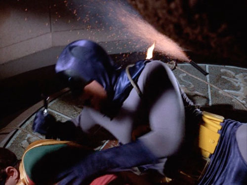 Did Batman's cape catch fire?
